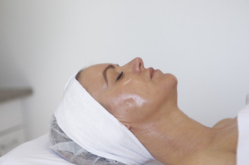 clinical peel woman in beauty clinic relaxing